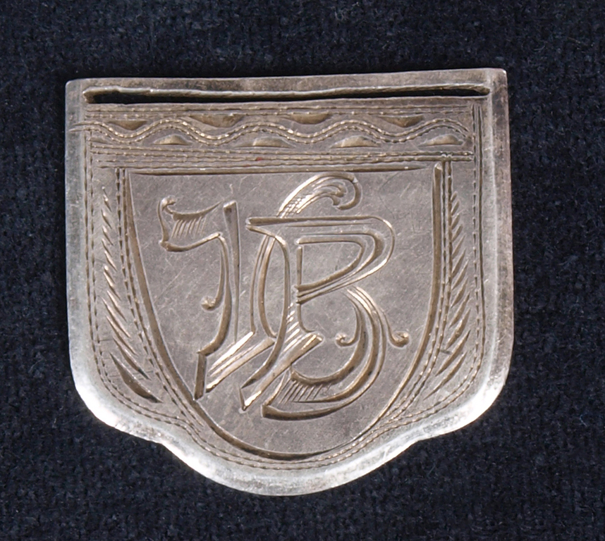 Silver badge/pendant