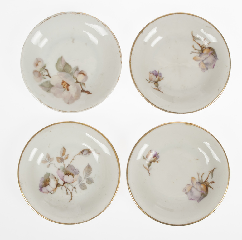 Porcelain saucers (4 pcs.) with a floral pattern