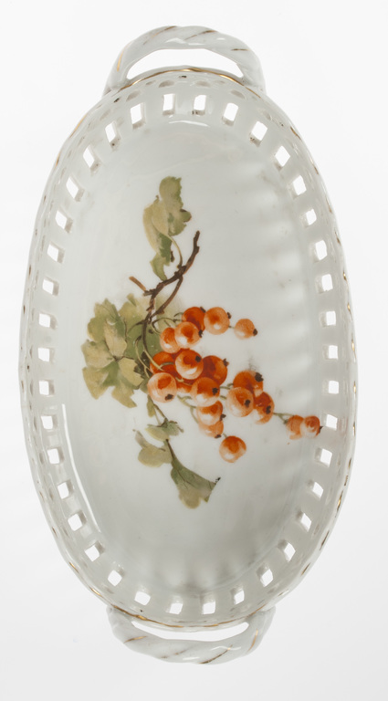 Oval porcelain utensil with eyelets and currant theme