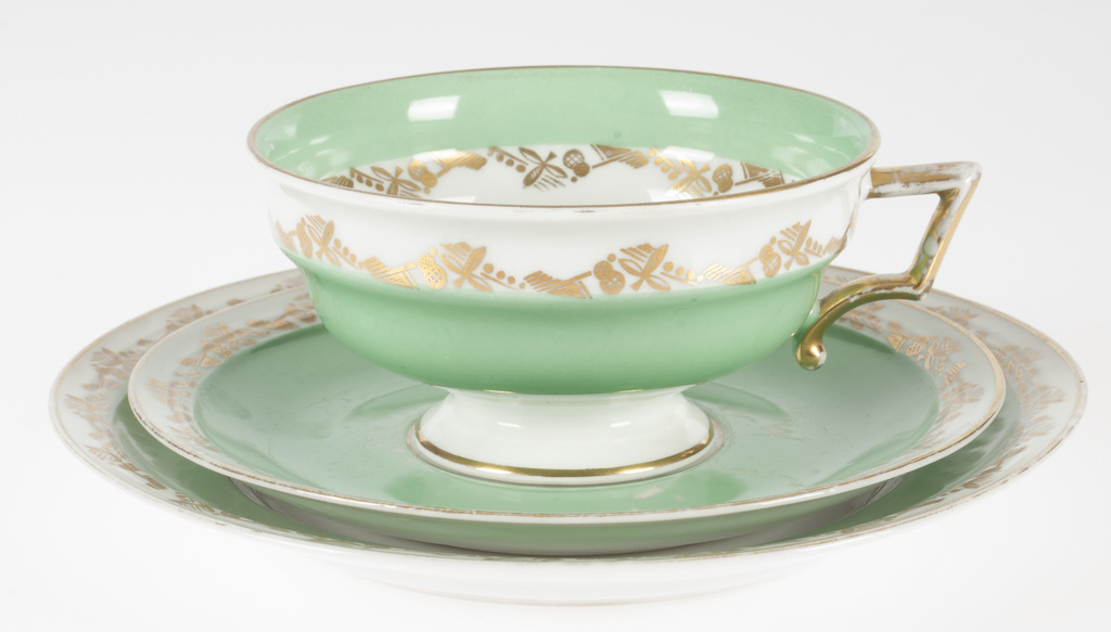 Porcelain cup with saucer and plate