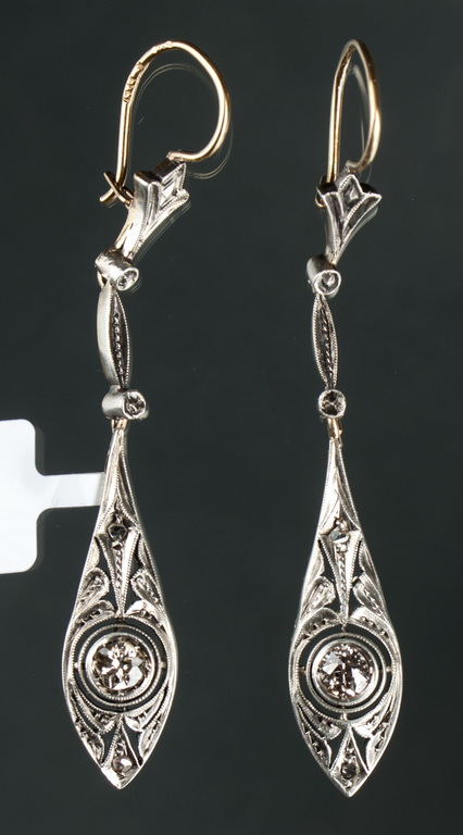Gold and silver alloy earrings with 2 natural brilliants and 4 diamonds