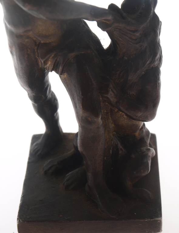 The bronze figure 