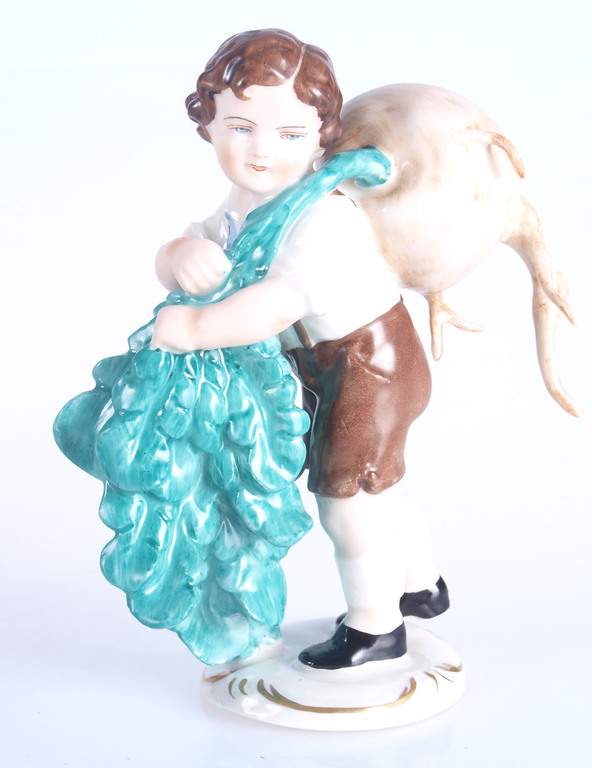 Porcelain figurine ”Boy with a beetroot”