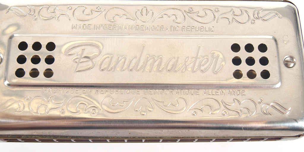 Mouth organ(harmonica) in the leather purse