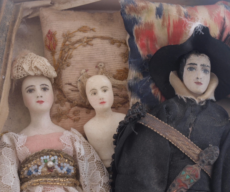 Dolls with heads made of stone