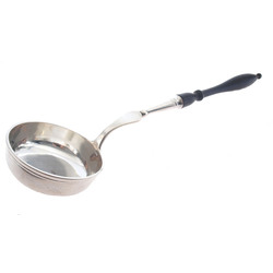 Silver soup spoon with wooden handle