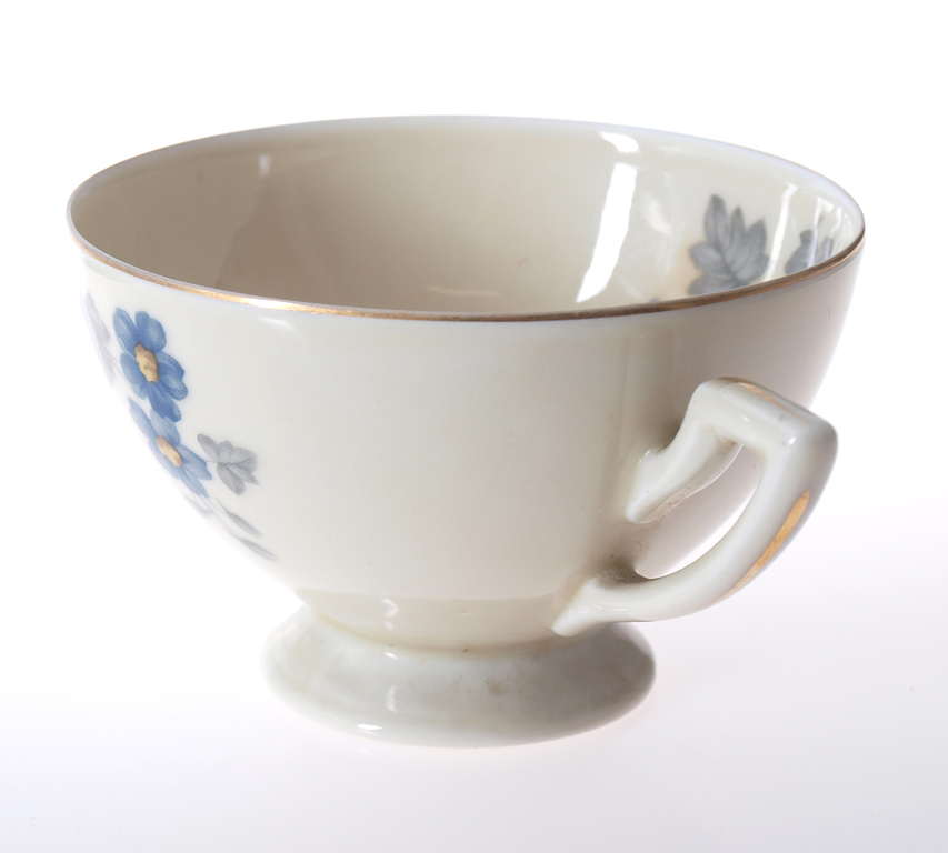 Porcelain cup with saucer ”Flower motive”