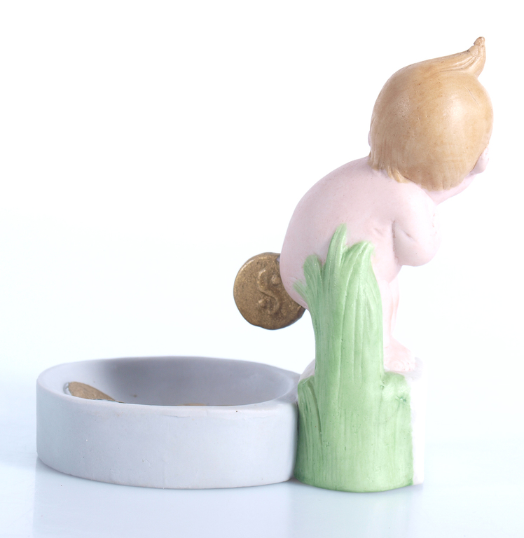Biscuite figurine - utensil “The child, who poo gold coins”