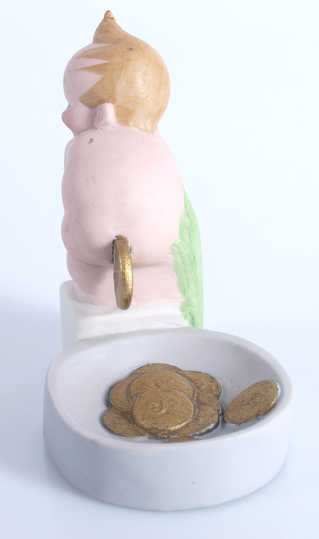 Biscuite figurine - utensil “The child, who poo gold coins”