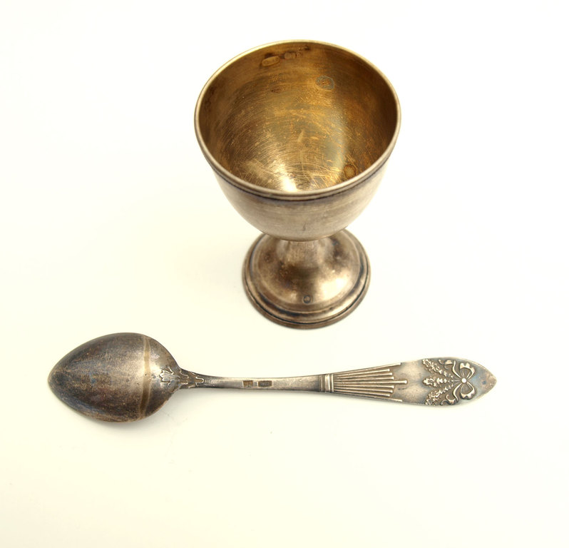 Silver spoon and cup