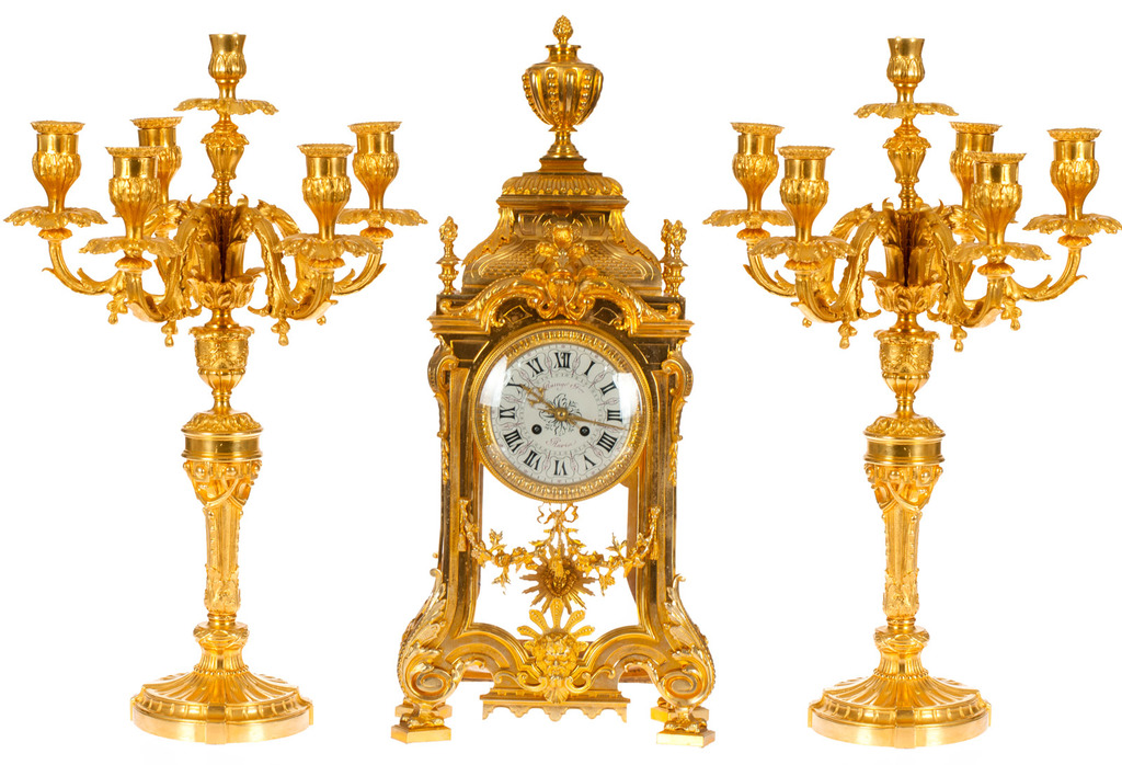 Gilded bronze clock with candlesticks