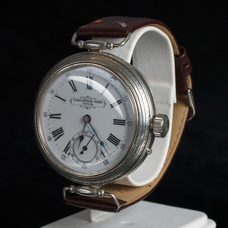 Silver watch with leather strap