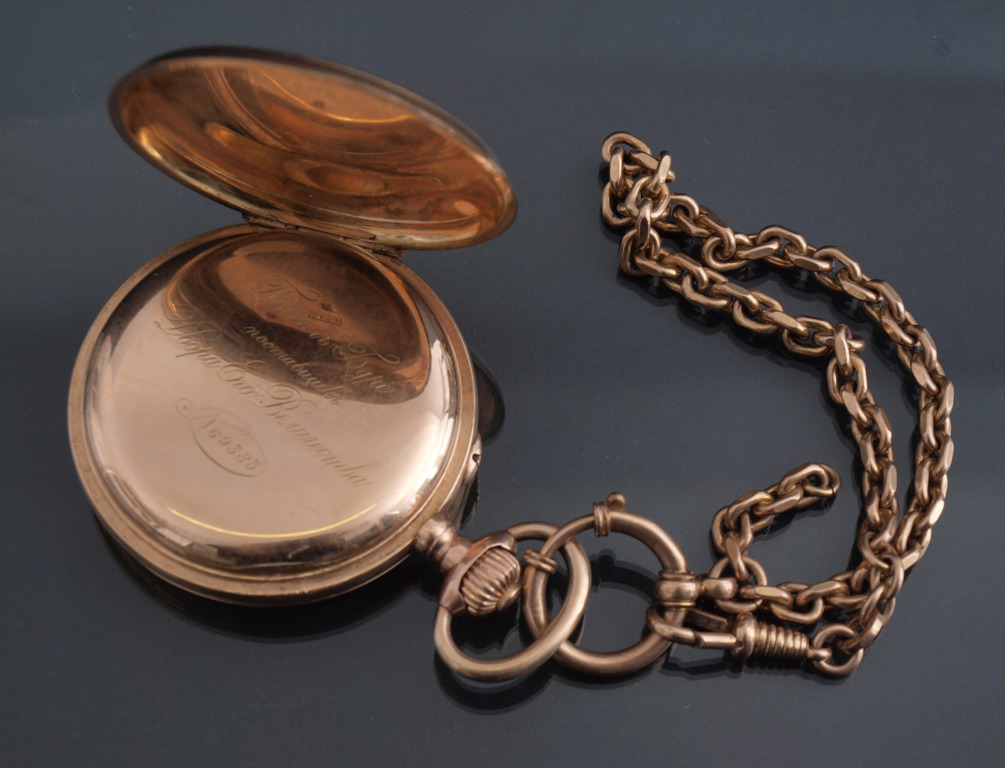 Gold pocket watch with chain  
