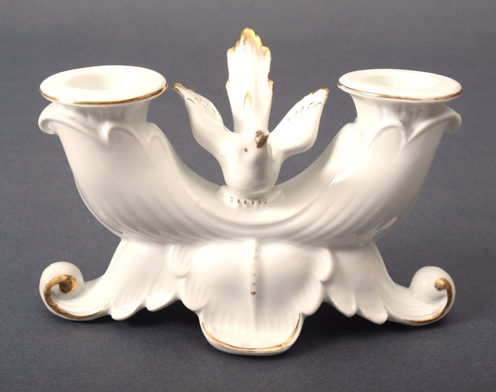 Porcelain candlestick with a bird