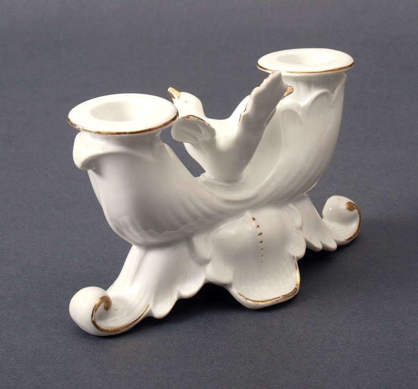 Porcelain candlestick with a bird