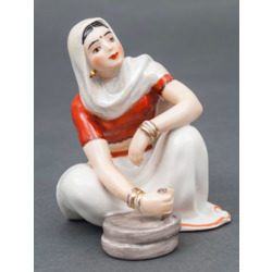 Porcelain figure „Indian women with millstones”