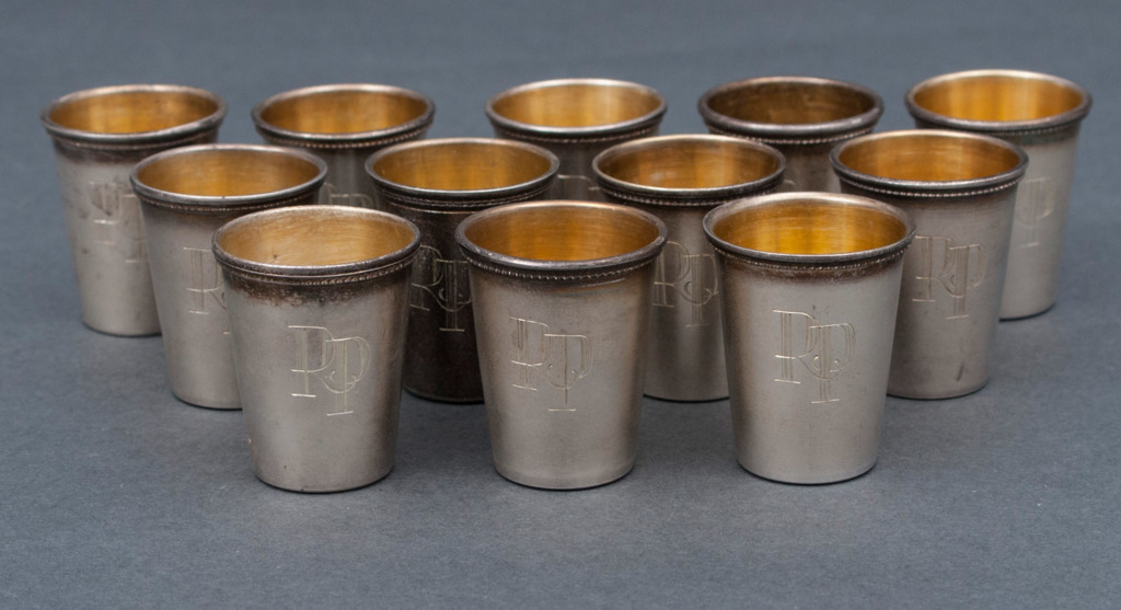 Gold plated silver cups (12 piec.)