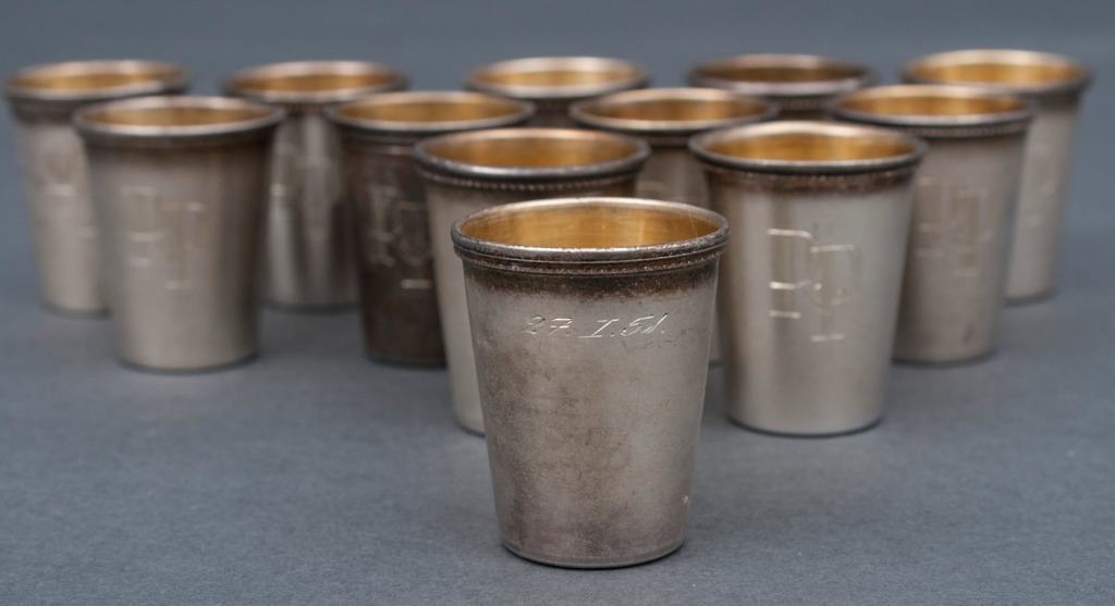 Gold plated silver cups (12 piec.)