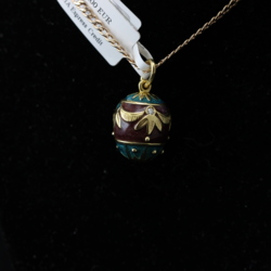 Gold pendant with diamonds and enamel