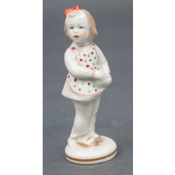 Porcelain figurine ''Girl with a red bow''