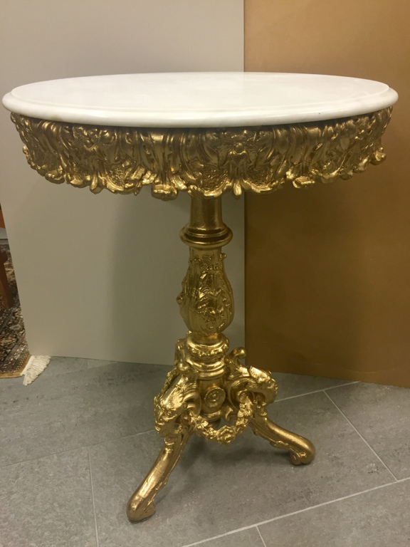 Gilded wooden table with marble surface