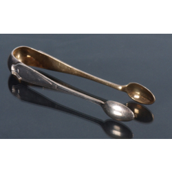 Silver tongs with gilding