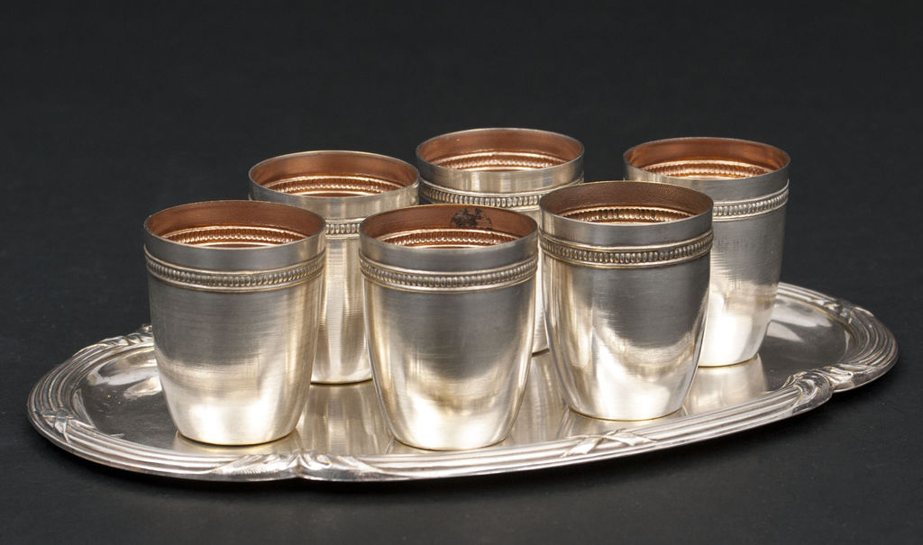 Six silver-plated cups and tray