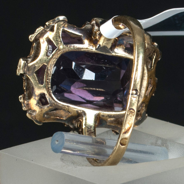 Golden ring with amethyst