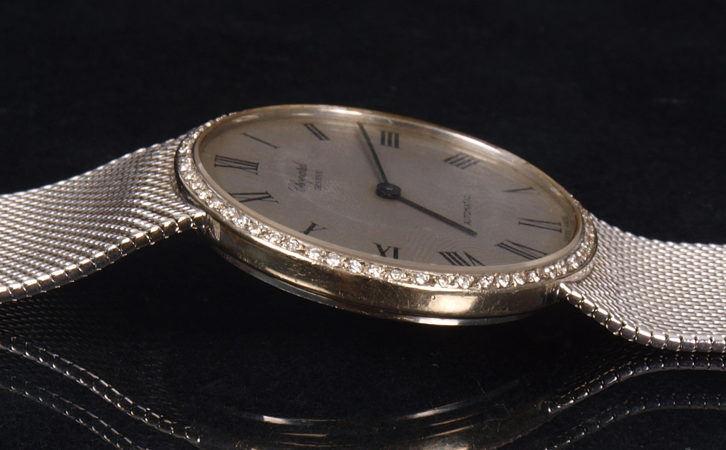 Chopard золотые часы с бриллиантами