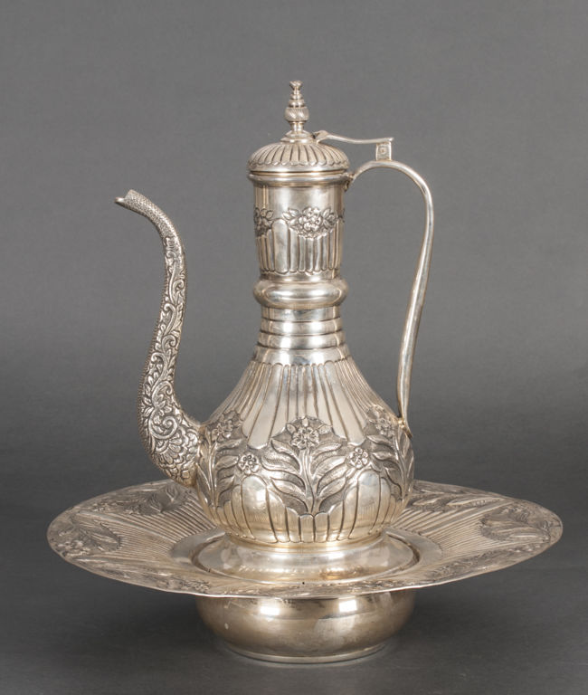 Silver teapot with heater