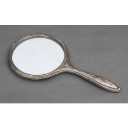 Mirror with silver case