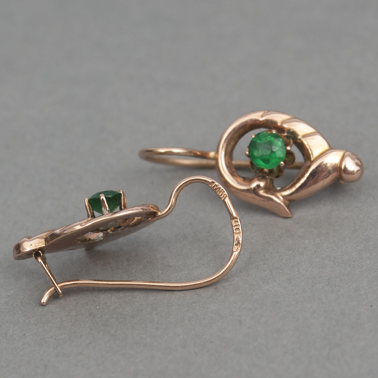 Gold earrings with green stones