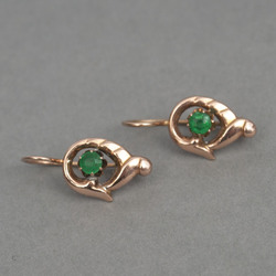 Gold earrings with green stones