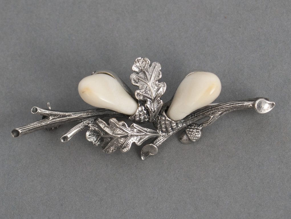 Silver brooch with bone
