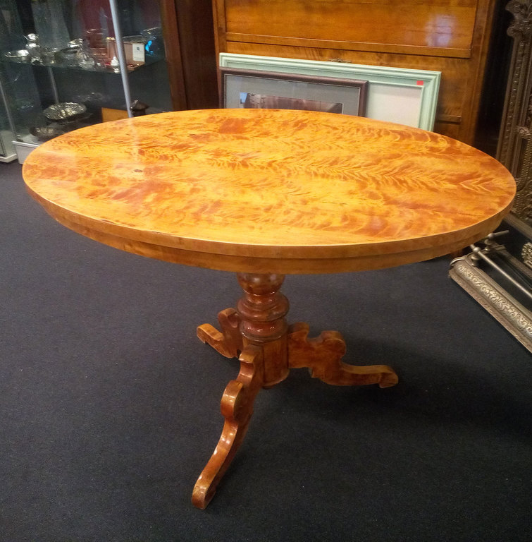Tea table with a blazing birch veneer