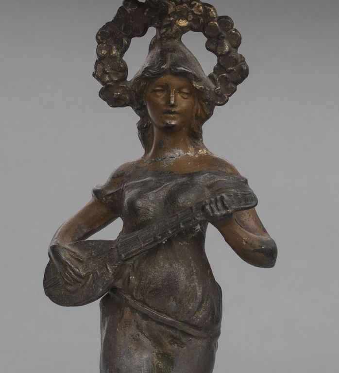 Spelter utensil for fruits 'Woman with string instruments'