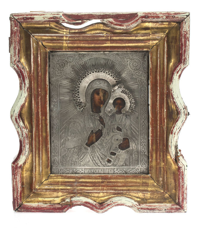 Silver icon in the wooden frame
