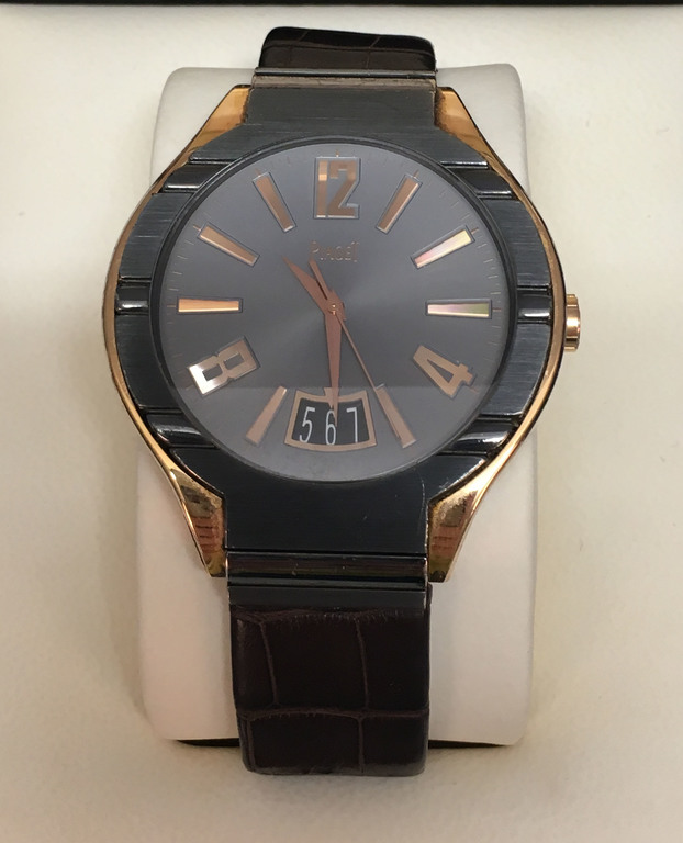 Piaget gold watch with leather strap