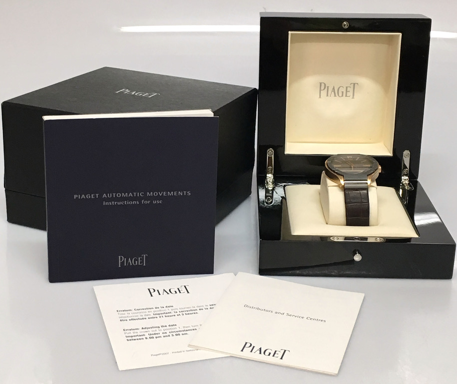 Piaget gold watch with leather strap