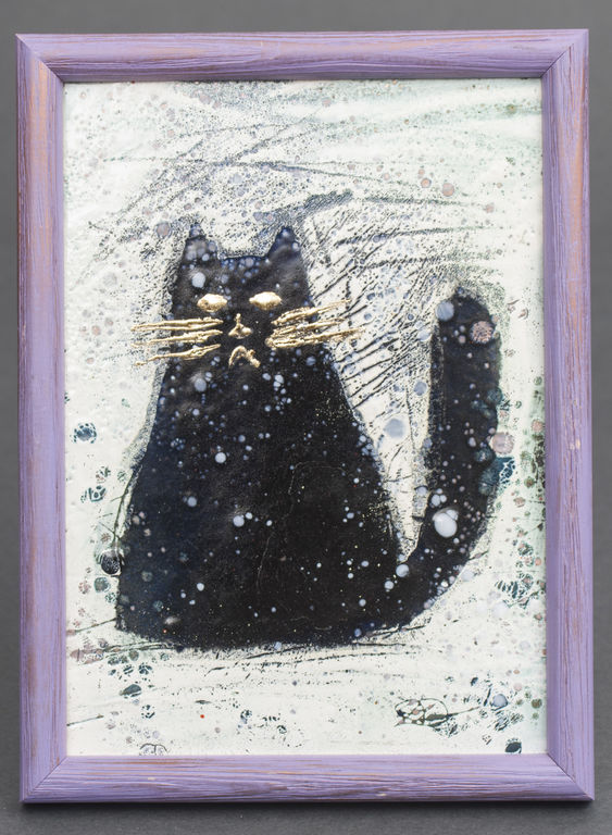 Black cat in snowstorm