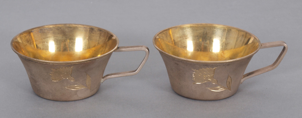 Two silver cups with gilding
