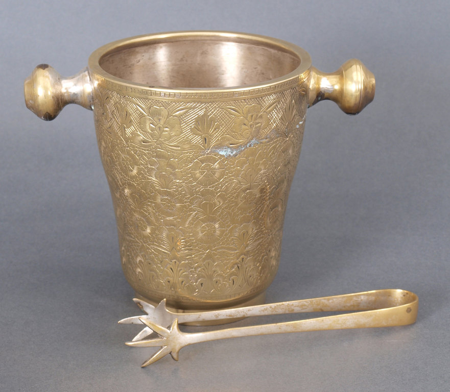 Metal bucket for champagne and tongs