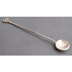 Silver cocktail spoon with coin