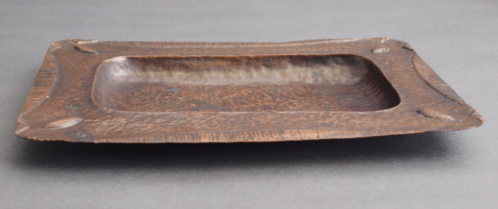 Art deco-style copper utensil