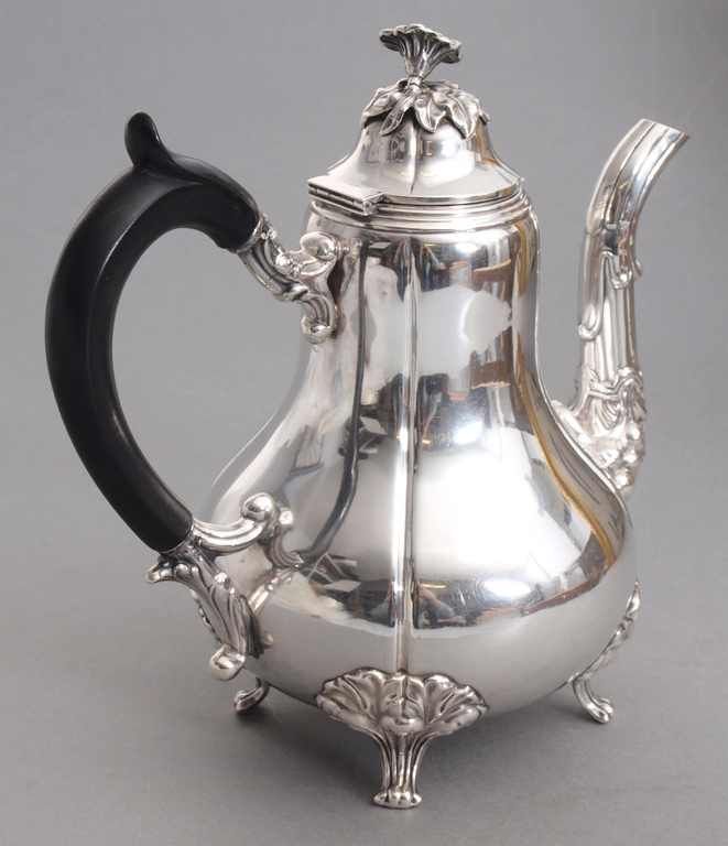 Silver teapot with wooden handle