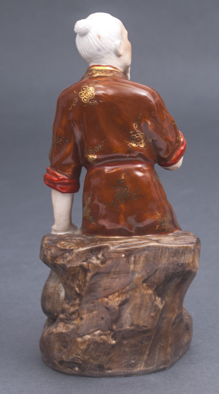 Porcelain figurine of Chinese men
