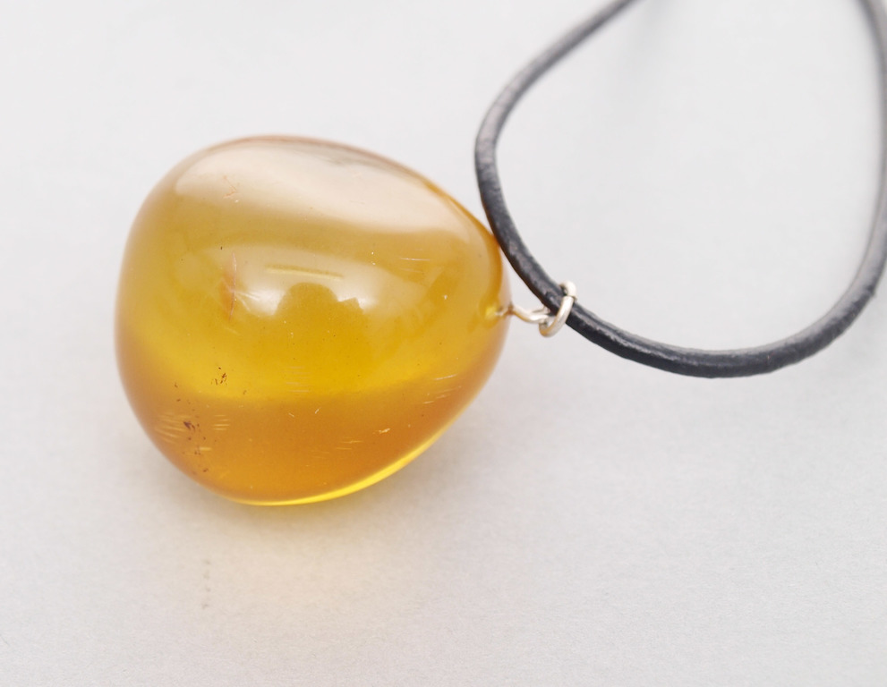 Antique and Natural Baltic Honey color amber pendant with leather twine,13.94 grams