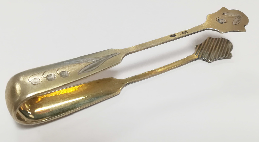 Guilded silver sugar tongs