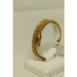 Gold bracelet with diamonds and emeralds