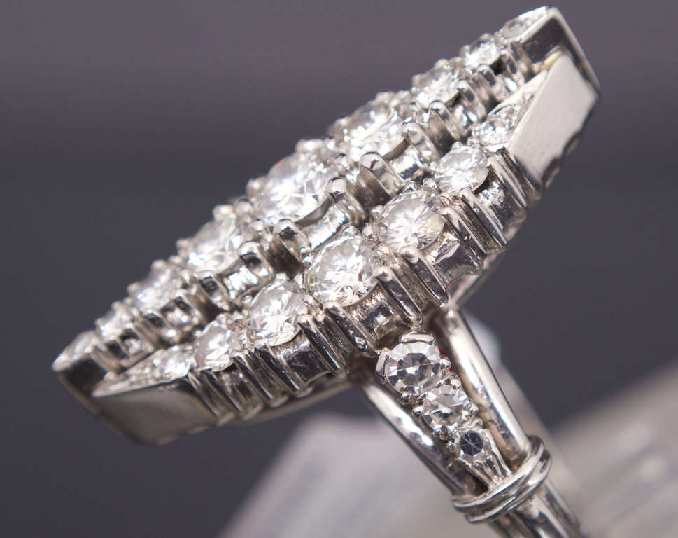 Platinum marquise shaped ring with diamonds